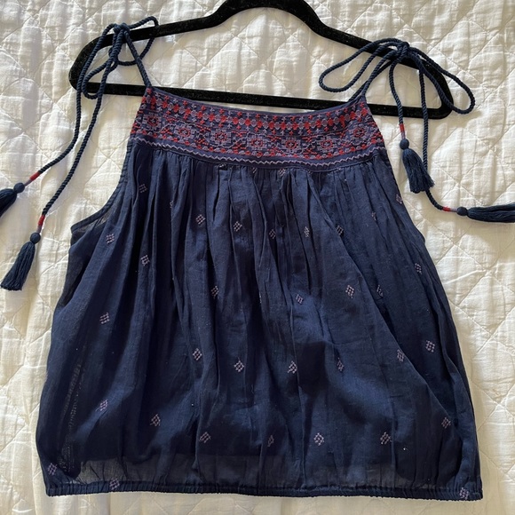 Like new- Free people tank top. Light weight. Rope tie straps - Picture 4 of 4